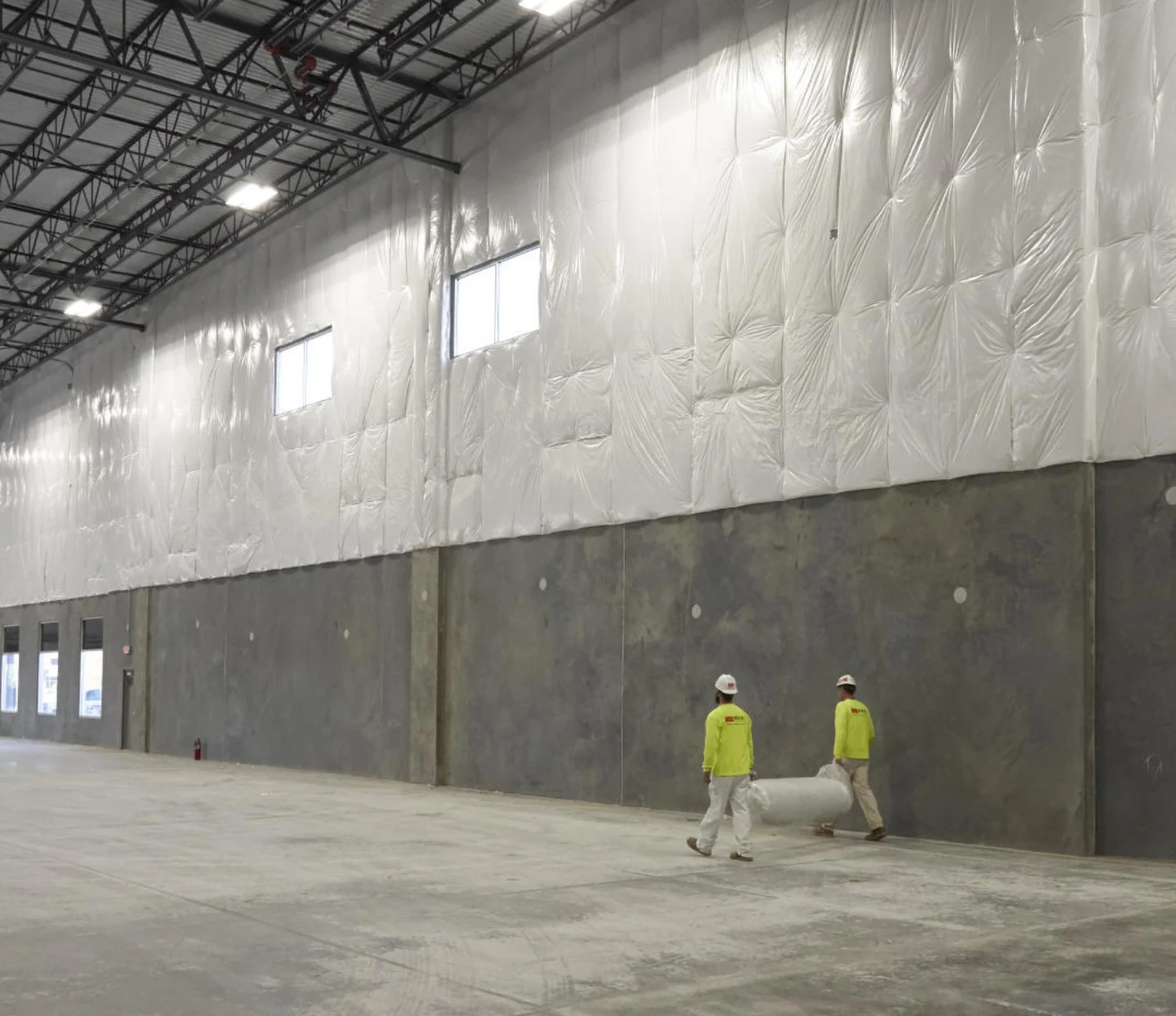 commercial_workers_carry_insulation